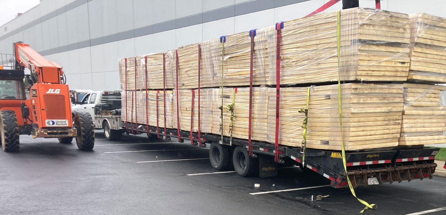 Rigid roof insulation prepared for transport