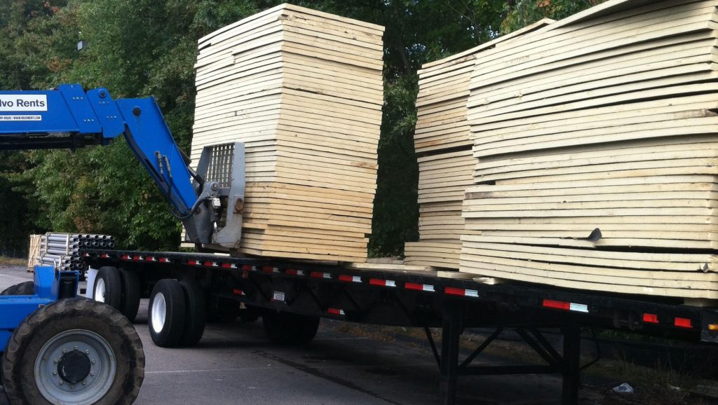 Roof insulation loaded on a trailer for recycling